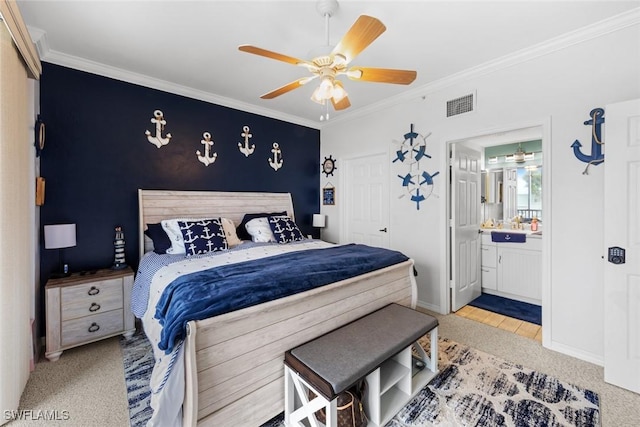 bedroom with ensuite bath, ceiling fan, crown molding, and light carpet