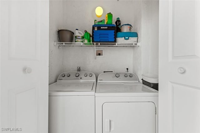 laundry area with washer and dryer