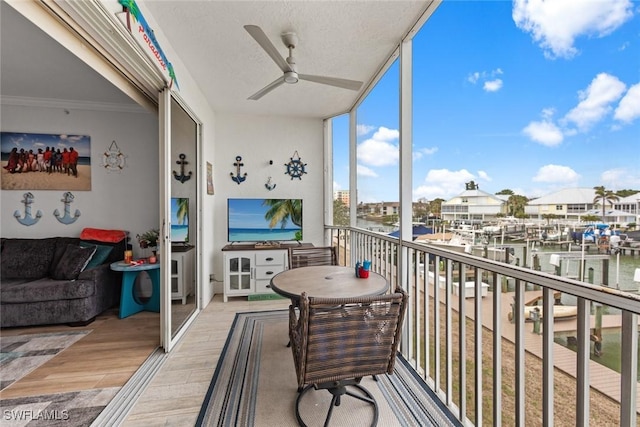 balcony featuring ceiling fan