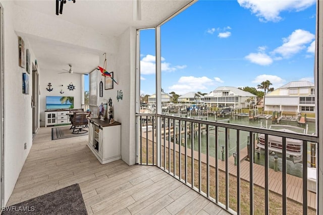 balcony featuring a water view