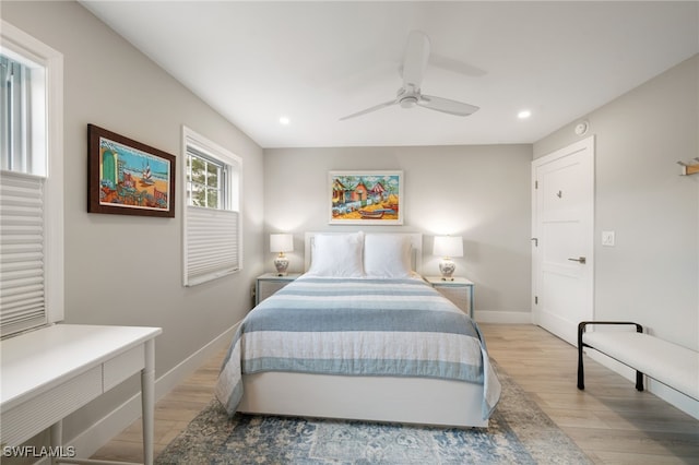 bedroom featuring ceiling fan and light wood-type flooring