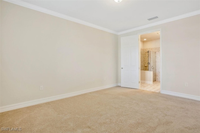 carpeted spare room with ornamental molding