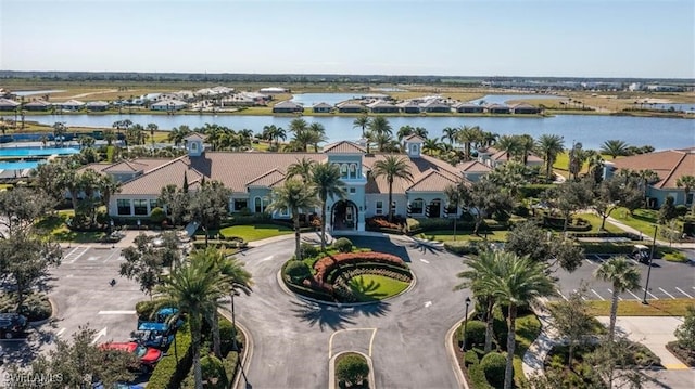 birds eye view of property featuring a water view