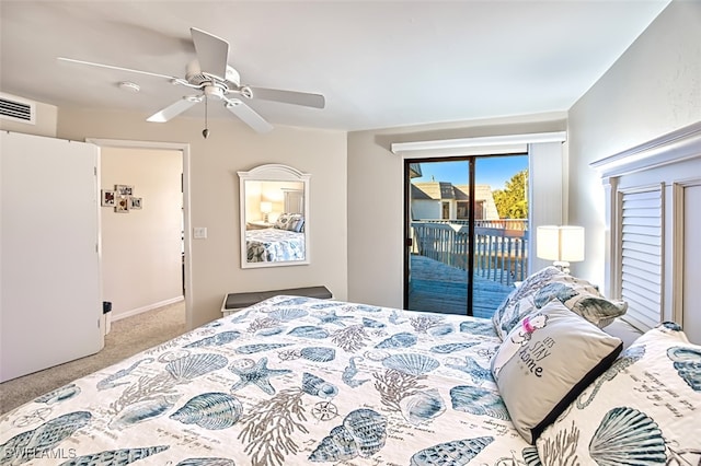 carpeted bedroom with ceiling fan and access to exterior