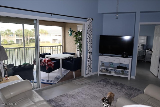 living room with concrete floors