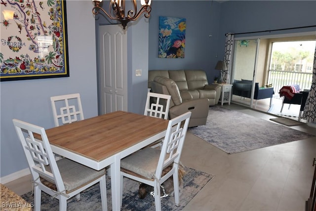 dining area with a notable chandelier