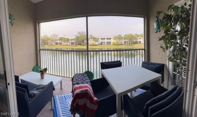 sunroom with a water view