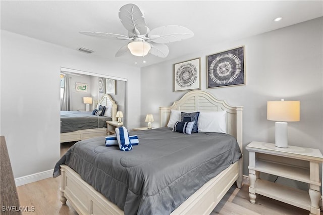 bedroom featuring ceiling fan and light wood-type flooring