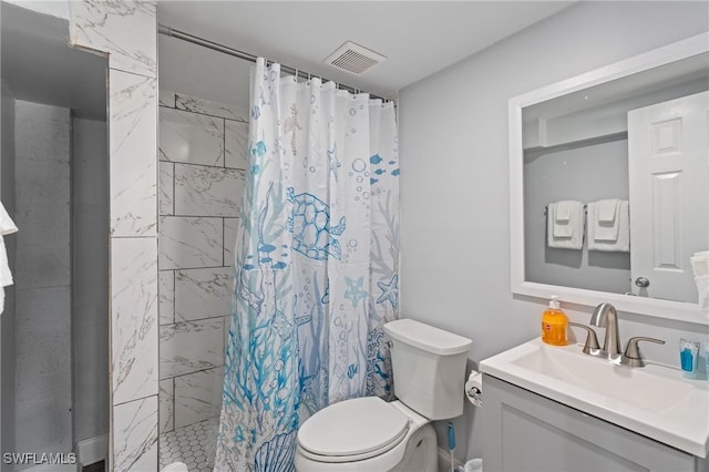 bathroom featuring toilet, vanity, and a shower with shower curtain