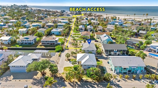 aerial view featuring a residential view and a water view