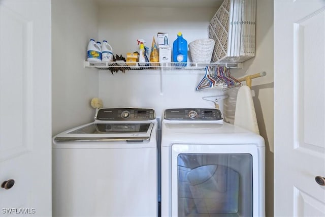 washroom featuring separate washer and dryer