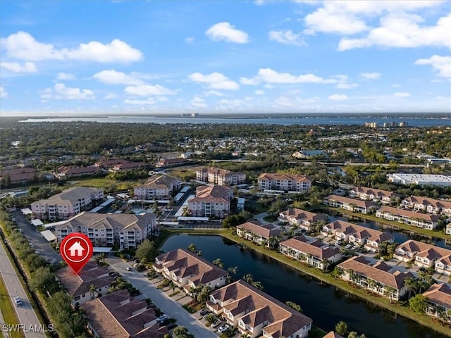 bird's eye view with a water view