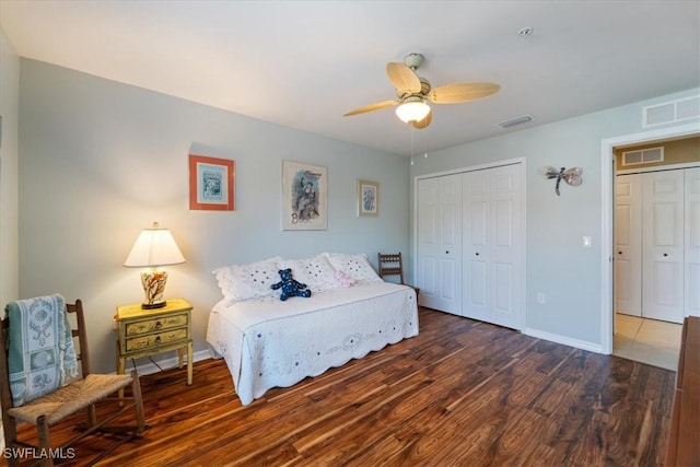 bedroom featuring ceiling fan and dark wood-type flooring