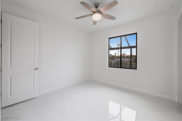 empty room featuring ceiling fan