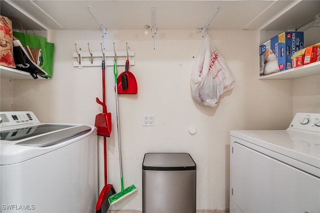 washroom featuring independent washer and dryer