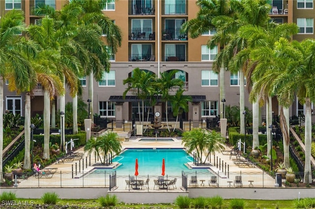 view of swimming pool featuring a patio area