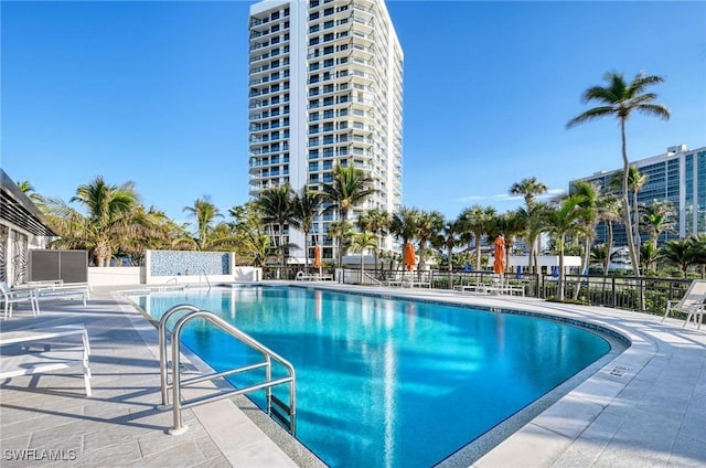 view of swimming pool featuring a patio