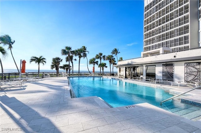 view of swimming pool featuring a patio