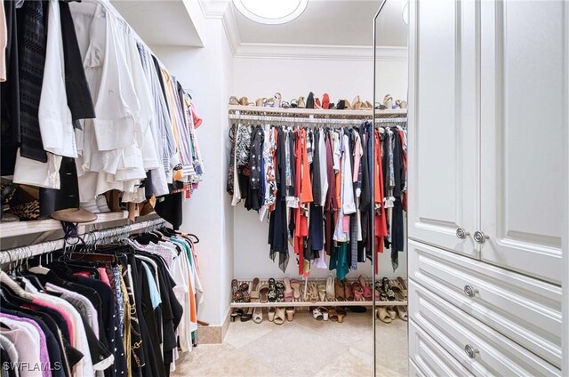 spacious closet featuring tile patterned floors