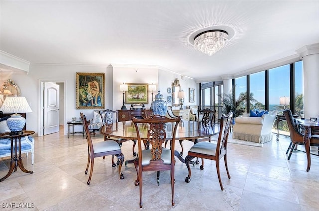 dining area featuring a wall of windows, an inviting chandelier, and crown molding