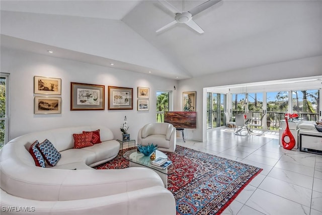 living room featuring high vaulted ceiling and ceiling fan