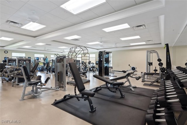 gym featuring a drop ceiling