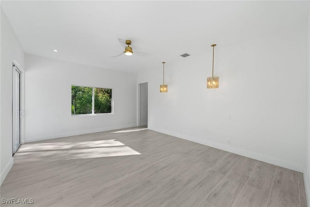 spare room featuring ceiling fan