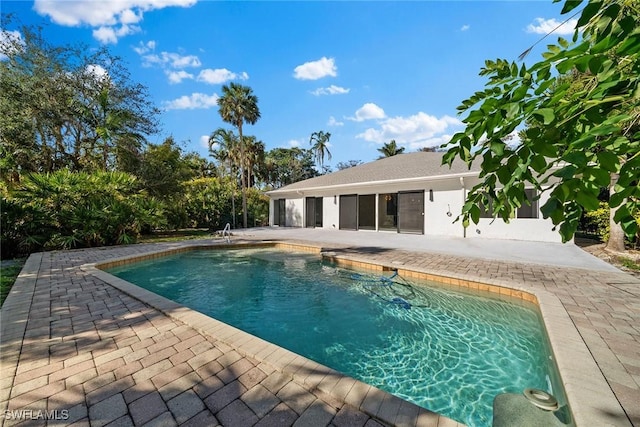 view of pool featuring a patio area