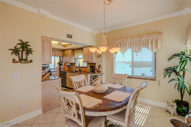 dining area featuring ornamental molding, ceiling fan, light tile patterned flooring, and sink