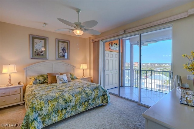 bedroom with ceiling fan, a closet, access to exterior, and carpet