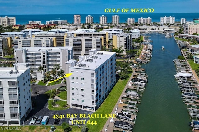 birds eye view of property featuring a water view