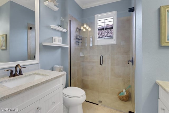 bathroom featuring toilet, vanity, ornamental molding, and walk in shower