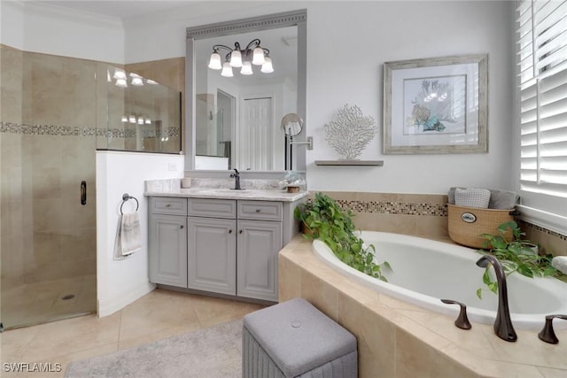 bathroom featuring vanity, tile patterned flooring, ornamental molding, and independent shower and bath