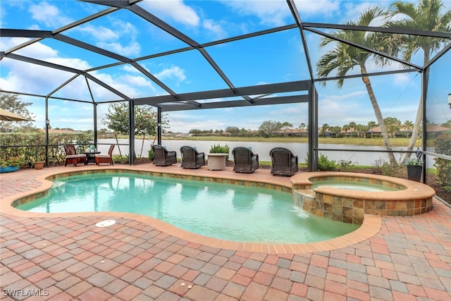 view of pool featuring a patio, a lanai, an in ground hot tub, and a water view