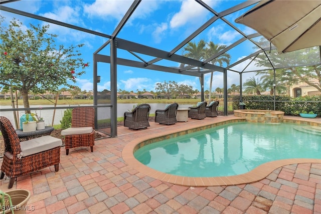 view of swimming pool featuring a water view, an in ground hot tub, glass enclosure, and a patio