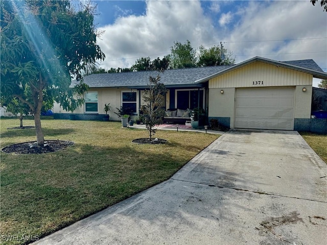 ranch-style house with a garage and a front lawn