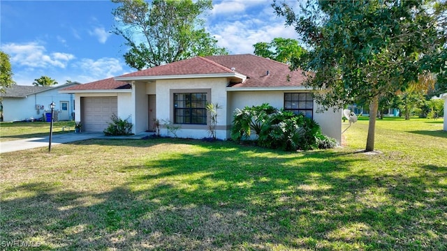 single story home with a front lawn and a garage