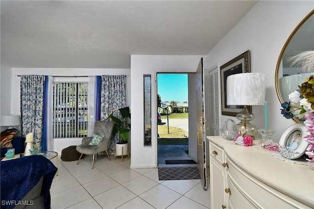 interior space featuring access to outside and light tile patterned floors