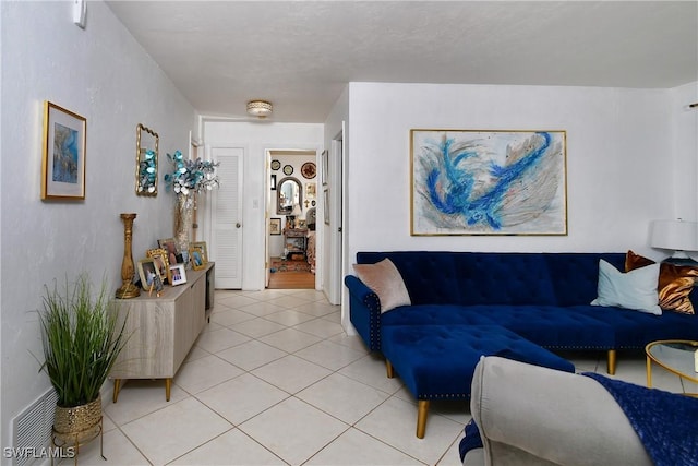 living room featuring light tile patterned flooring