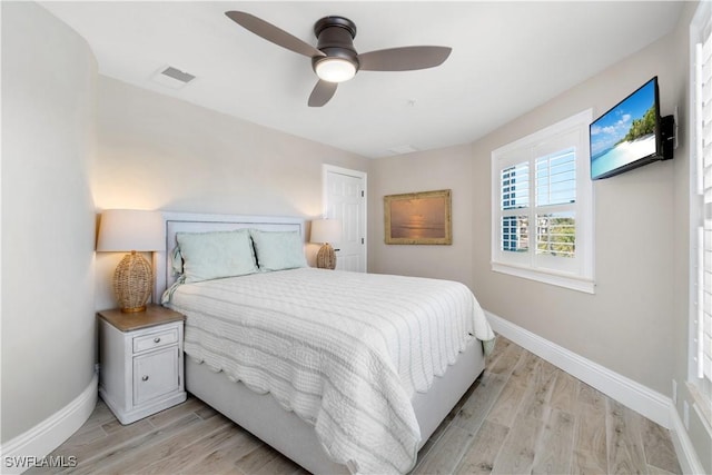 bedroom featuring ceiling fan and light wood-type flooring