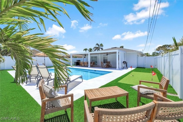 639 98th Ave N, Naples, FL 34108 - view of pool with a fenced backyard, a putting area, ceiling fan, and a patio area