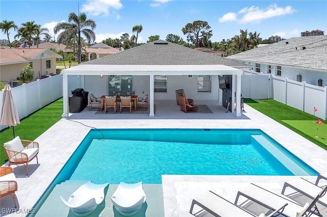 639 98th Ave N, Naples, FL 34108 - view of pool featuring a patio area and a fenced backyard