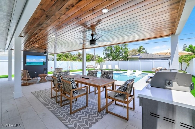 639 98th Ave N, Naples, FL 34108 - view of patio with a fenced backyard, a ceiling fan, and outdoor dining area