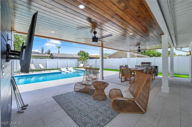 639 98th Ave N, Naples, FL 34108 - view of patio featuring outdoor dining area, a fenced backyard, and ceiling fan