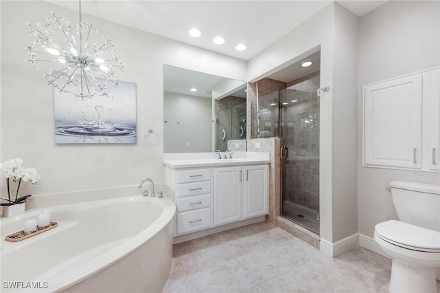 bathroom featuring toilet, a garden tub, a shower stall, and vanity