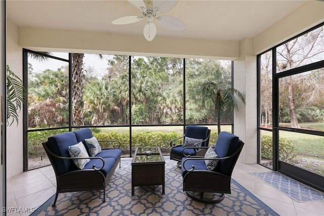 sunroom / solarium with ceiling fan