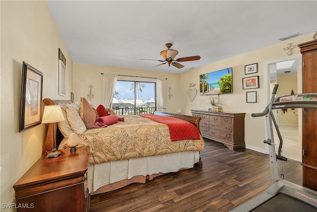 bedroom featuring ceiling fan, dark wood-type flooring, and access to outside