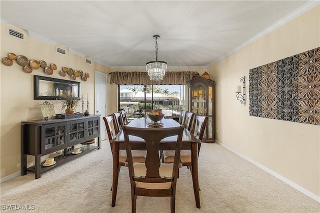 dining space featuring light colored carpet, an inviting chandelier, and crown molding