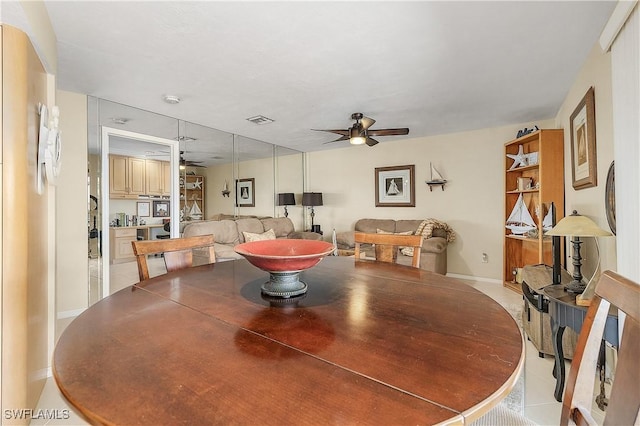 dining space featuring ceiling fan