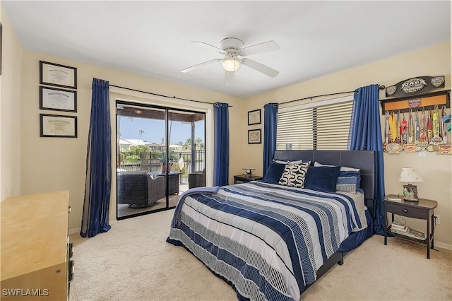 carpeted bedroom with access to outside and ceiling fan